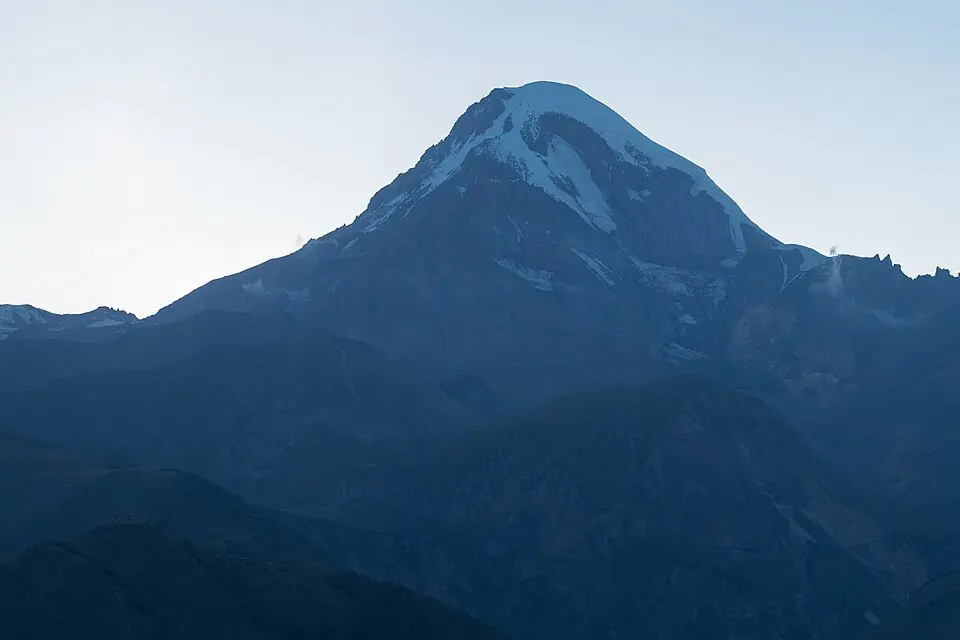 Mount Kazbek in evening light from Stepantsminda
