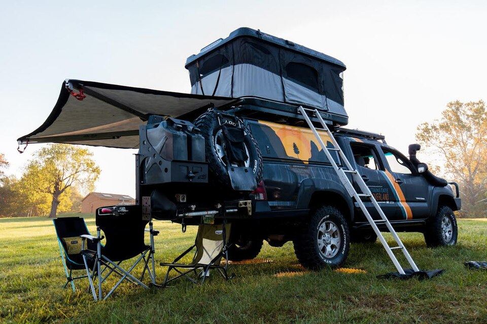 4x4 with an open roof-top tent